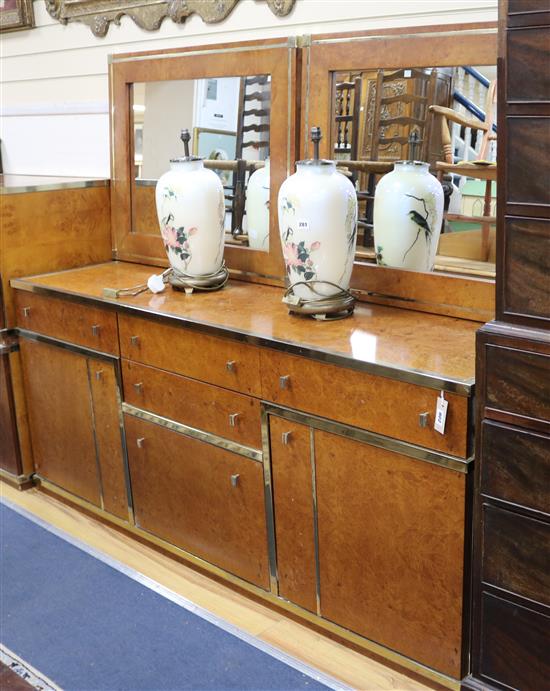 A 1970s Italian burr walnut side cabinet and a pair of matching wall mirrors W.182cm.
